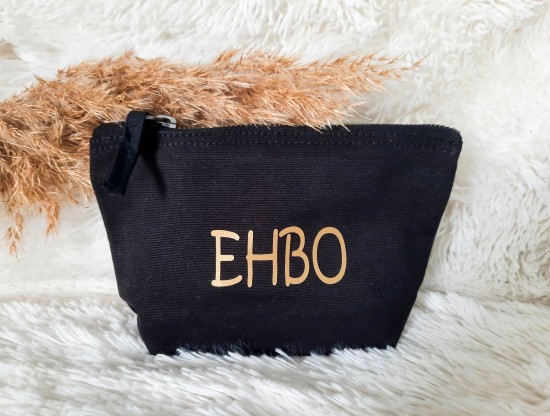 Zwarte organizer EHBO pleister pijn baby